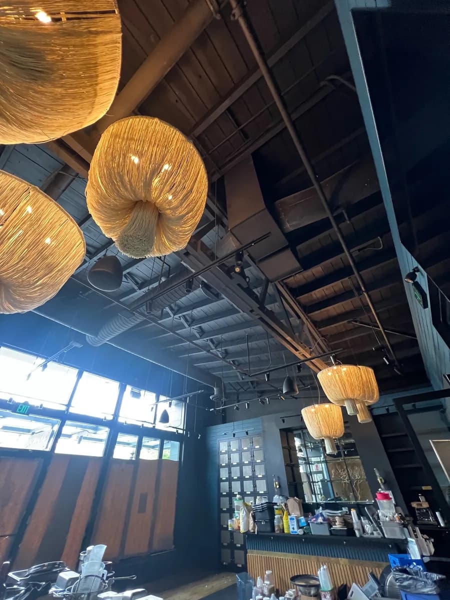Bar and lounge area of a Bellevue restaurant space during the turnover clean