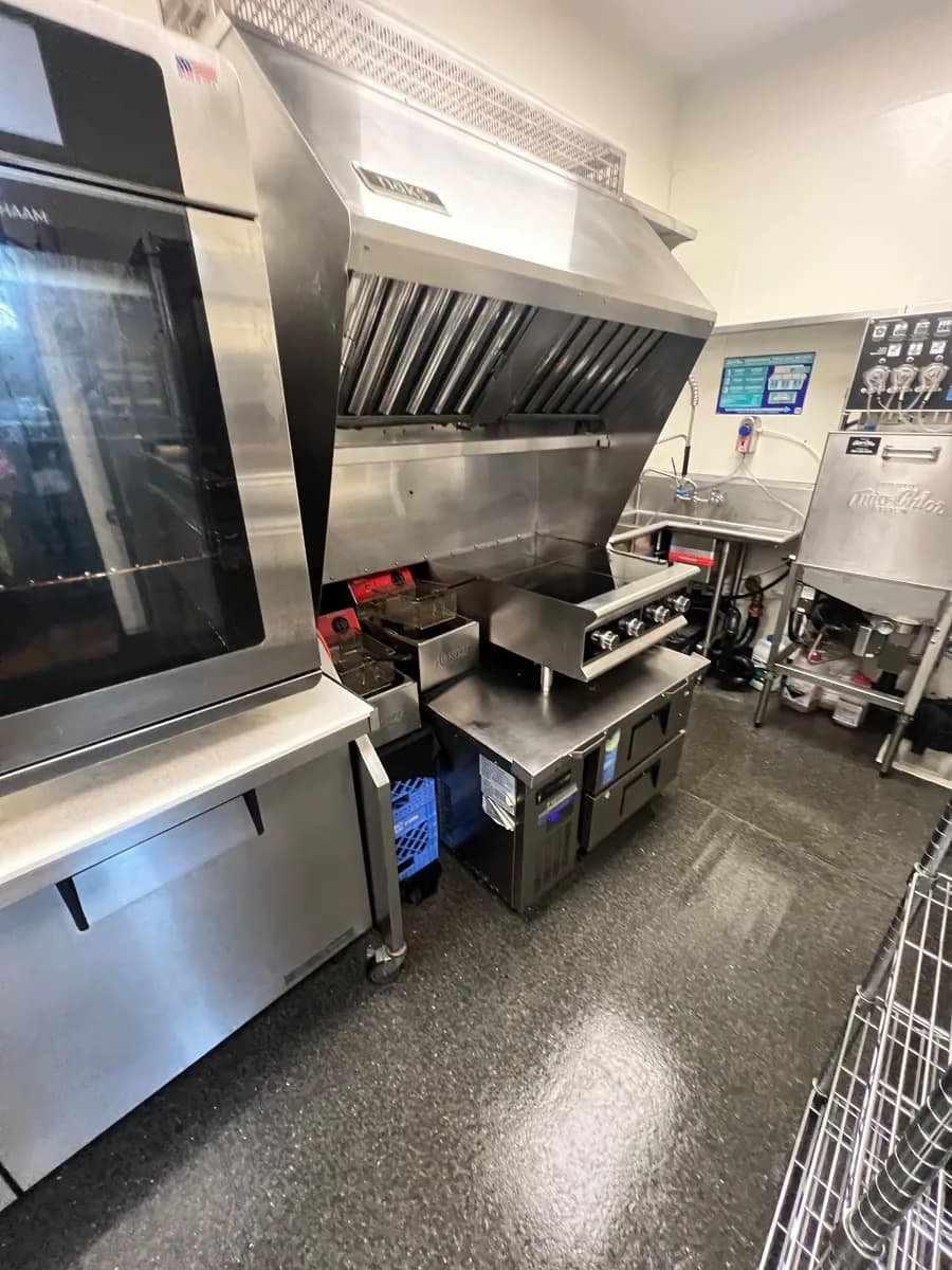 Commercial kitchen line and exhaust hood degreased in a Bellevue restaurant turnover