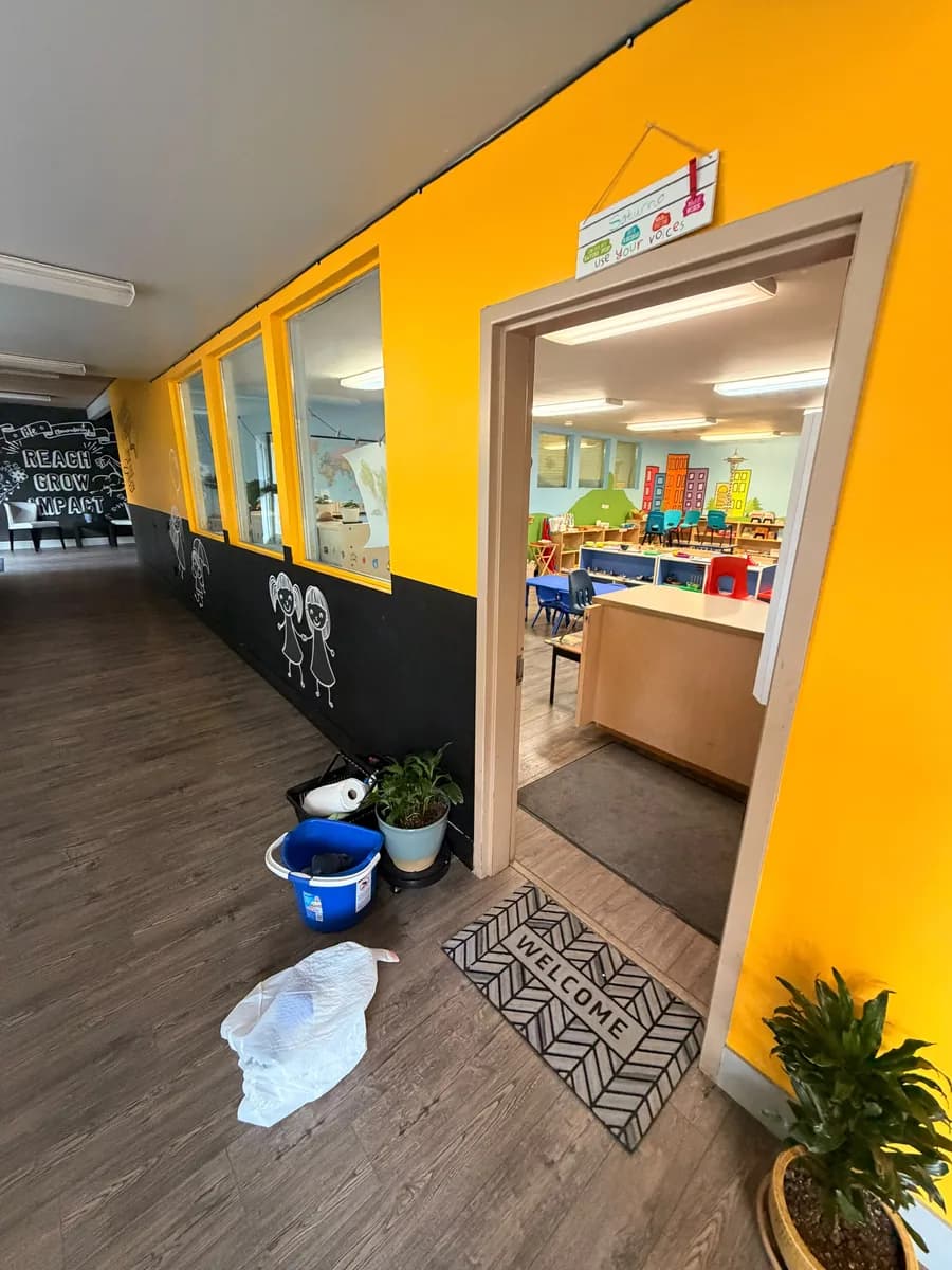 Hallway and entry mats mopped at a Kirkland Montessori school after hours