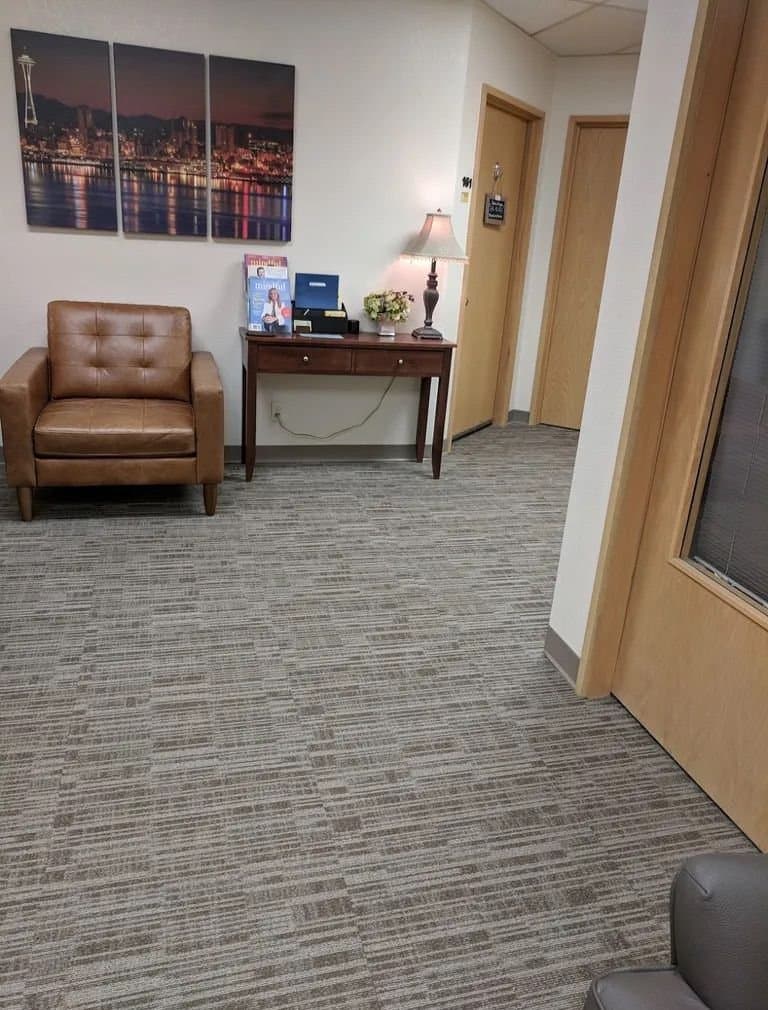 Office hallway and lounge area after nightly janitorial service