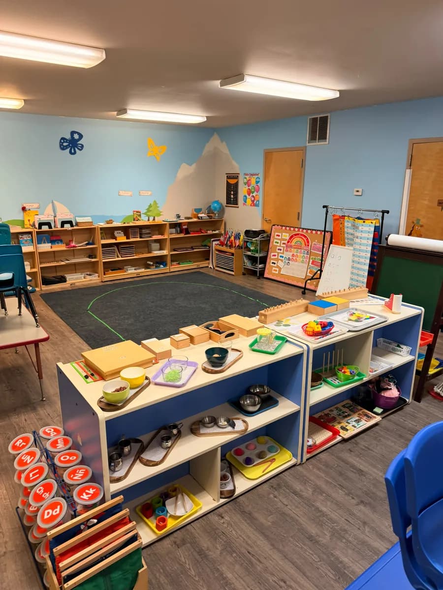 Montessori classroom with low open shelving and learning materials in Kirkland