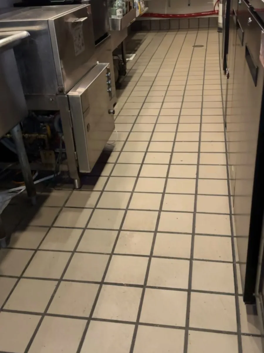 Restaurant kitchen line and tile floor at The Pizza Coop & Ale House in Woodinville