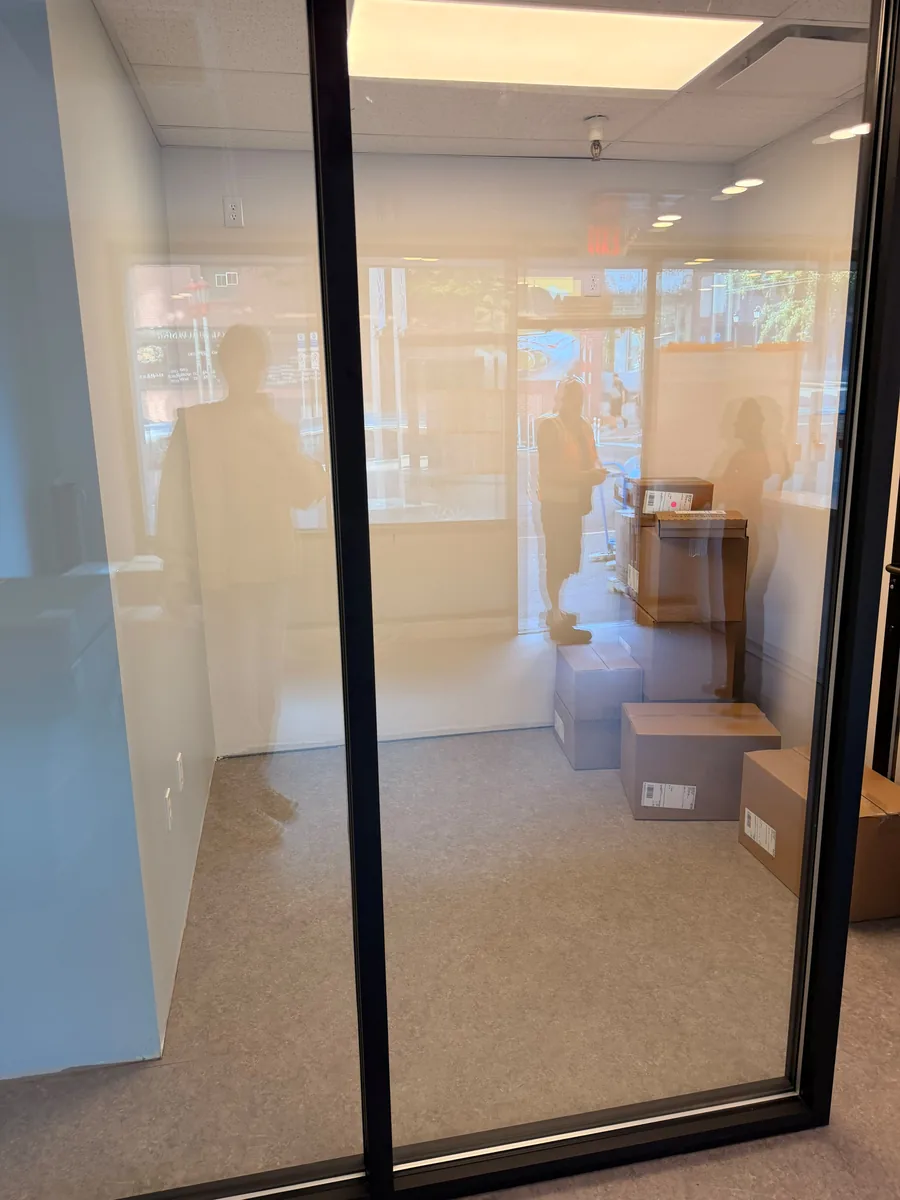 Glass-partitioned office in a medical clinic after post-construction cleaning