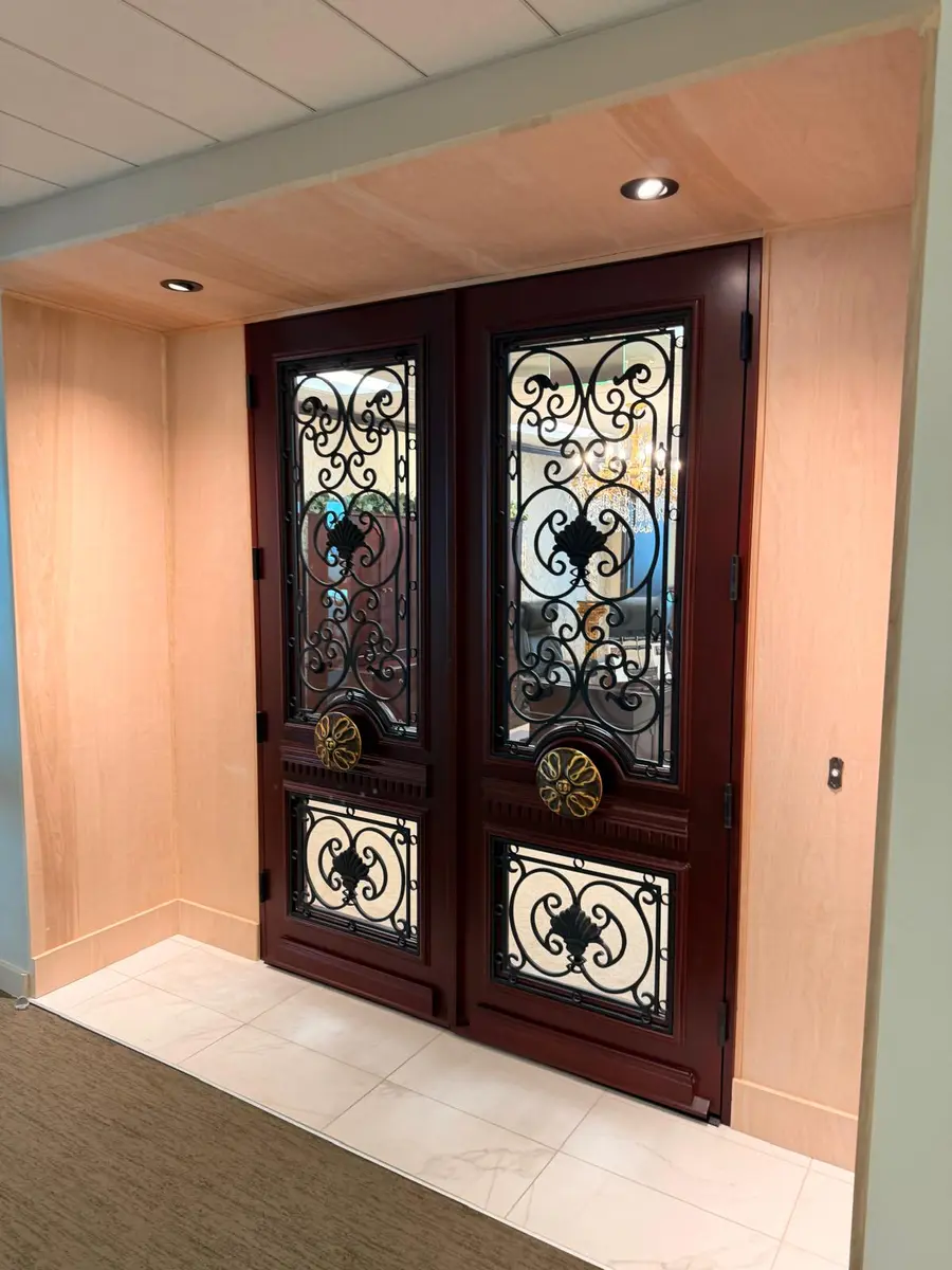 Ornate entrance doors polished at a downtown Seattle law office